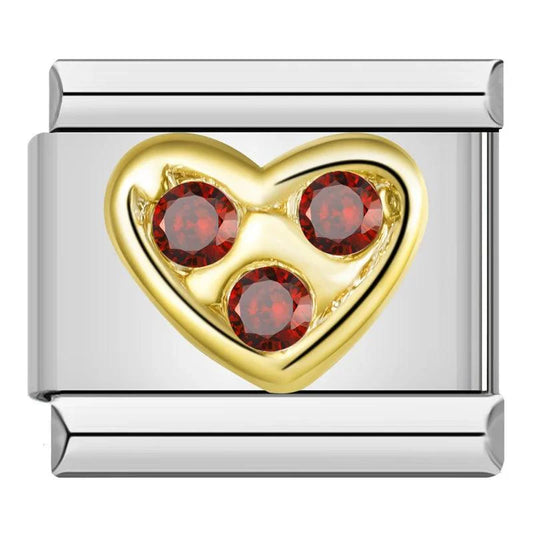 Corazón dorado con piedras rojas, en plateado